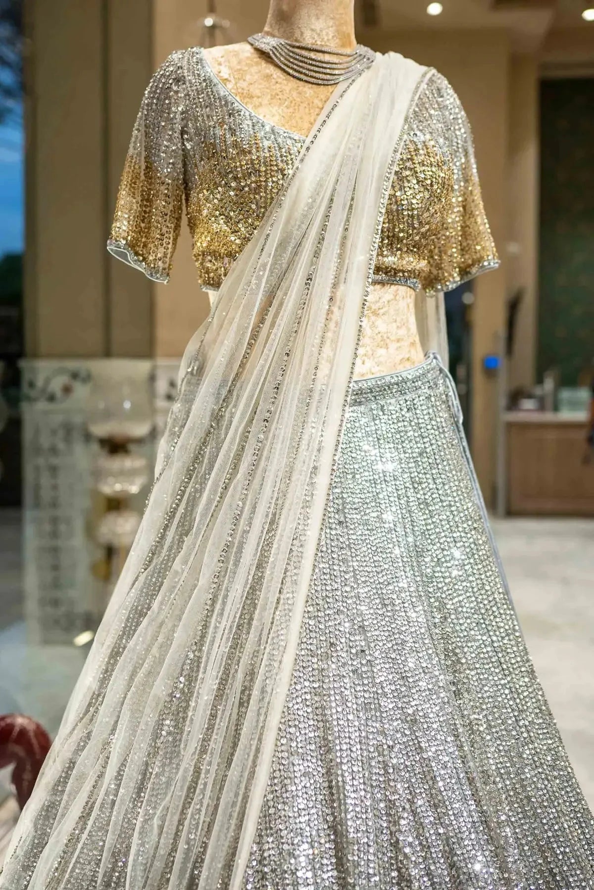 Silver And Gold Mix Border Net Lehenga - Pallodstore