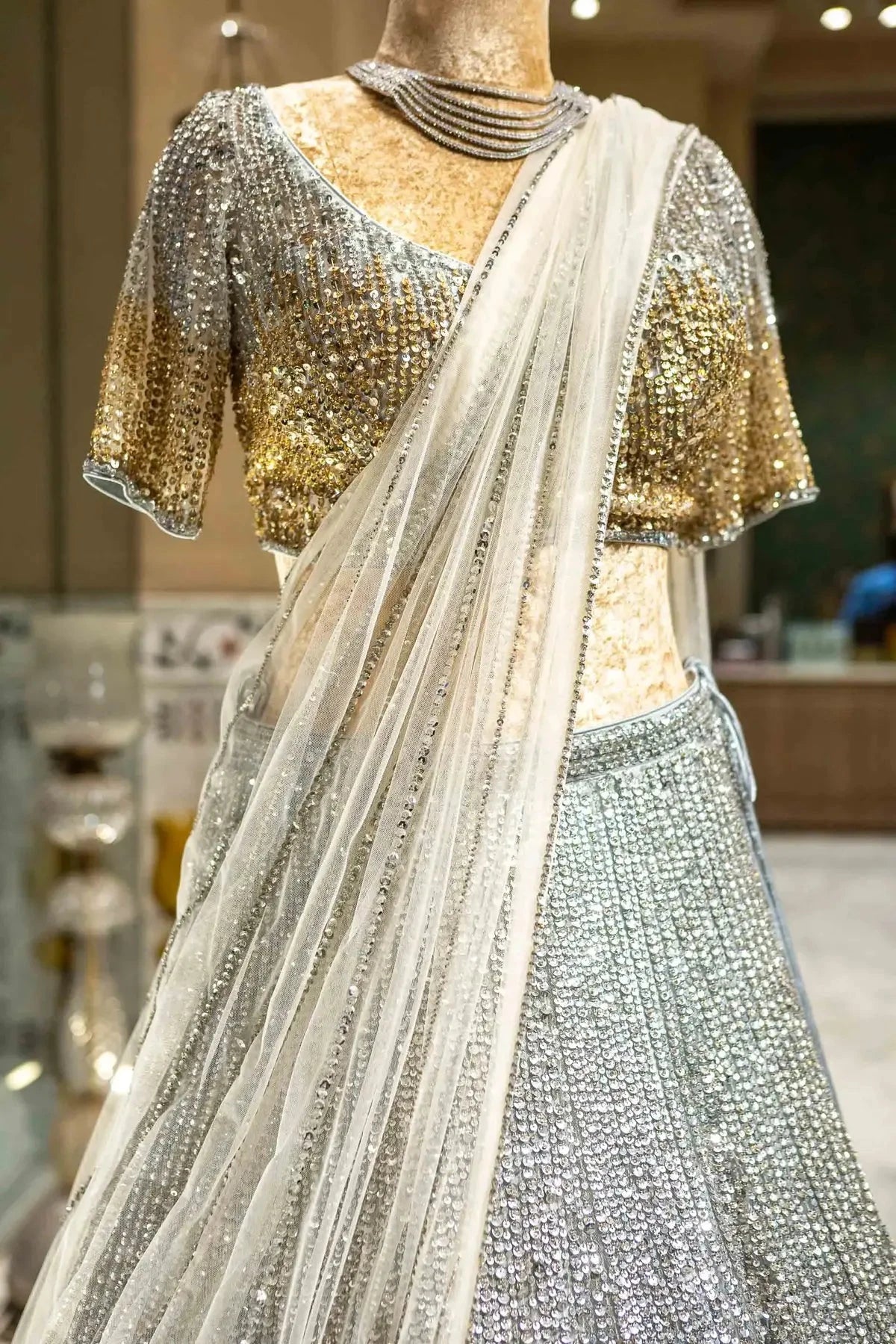 Silver And Gold Mix Border Net Lehenga - Pallodstore
